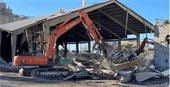 AGUA MANSA COMMERCE PARK:  PACK HOUSE DEMOLITION USING EXCAVATORS